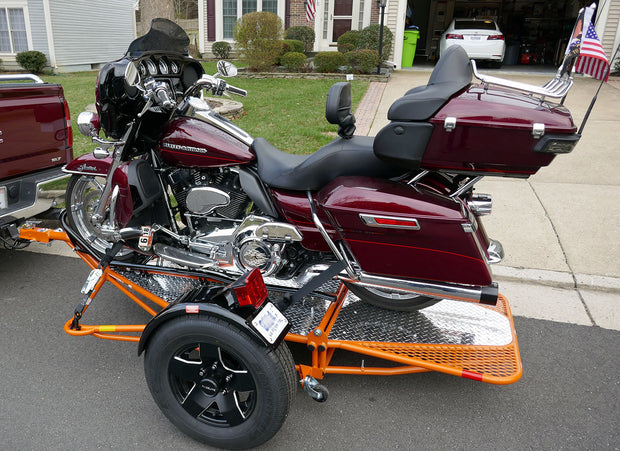 Orange SRU Motorcycle Trailer with Harley Davidson
